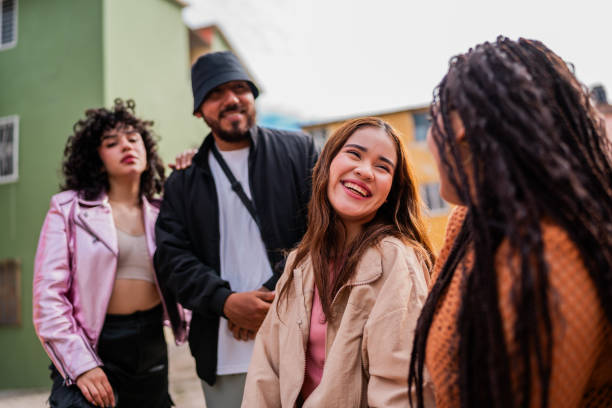 istock Young friends talking outdoors 2201761732