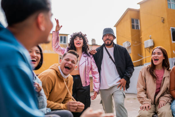 istock Young friends talking outdoors 2201761749
