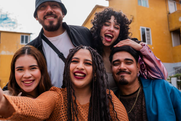 istock Young friends taking a selfie outdoors - Camera point of view 2201761937