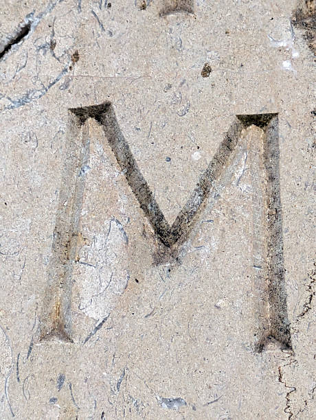 istock Written Wording in Distressed State Typography Found Ransom Letter M 2201762019