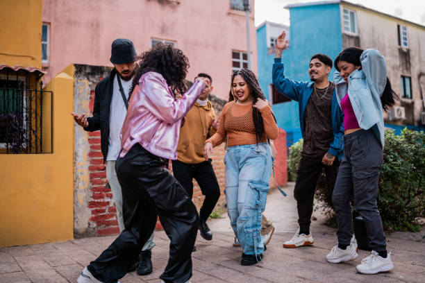 istock Friends dancing outdoors 2201762079