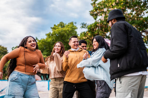 istock Friends dancing outdoors 2201762539