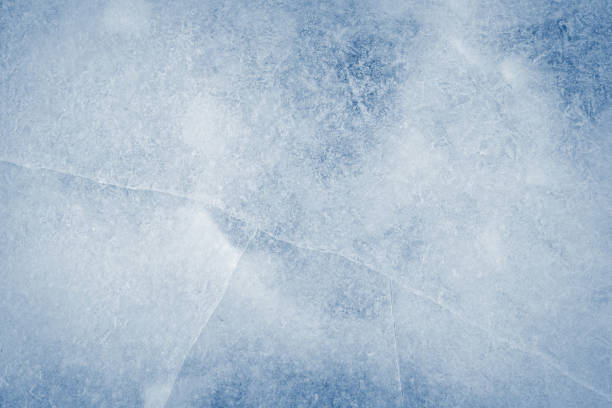 Ice texture crystal, blue tones background. Textured cold frosty surface of ice with cracks. Icy details
