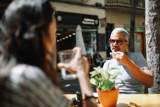 istock Friends sitting in a cafe in Barcelona 2201763782