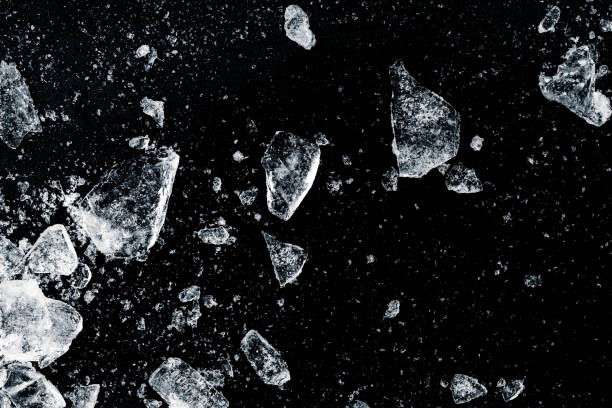 istock Ice, crushed on a black background. Shards of crushed ice. 2201764140