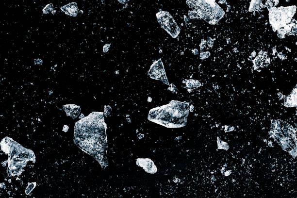 istock Ice, crushed on a black background. Shards of crushed ice. 2201764199