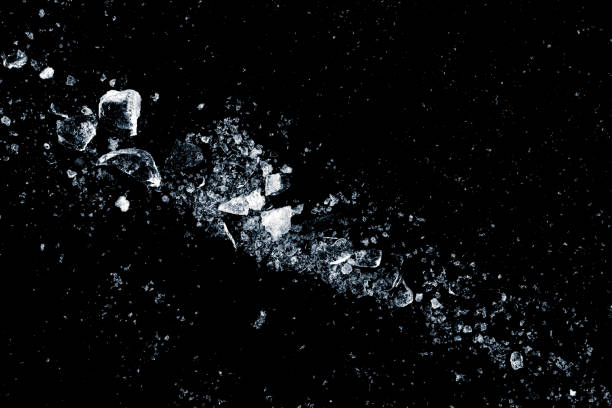 istock Ice, crushed on a black background. Shards of crushed ice. 2201764210