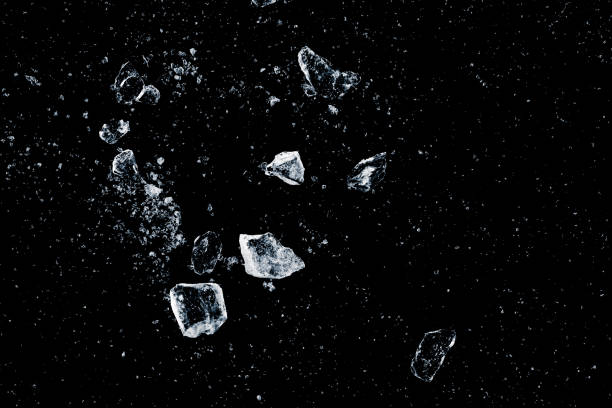 istock Ice, crushed on a black background. Shards of crushed ice. 2201764232
