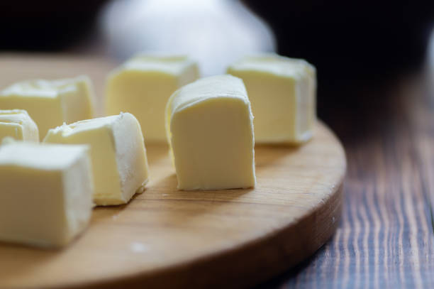 istock close-up of butter cubes on a wooden board 2201769201