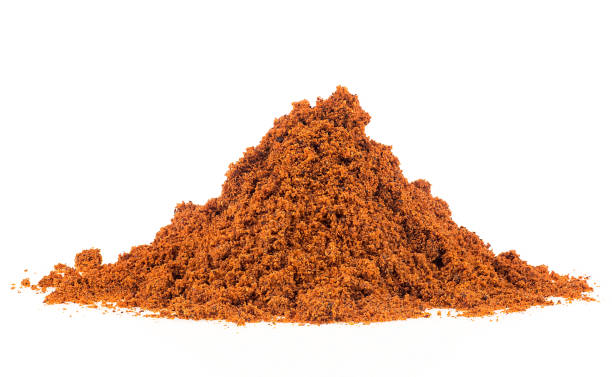 istock Pile of fragrant grated nutmeg isolated on a white background 2201769463