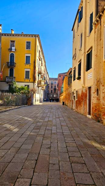 istock Venice, where silence melts into the waters, and the bridges are verses crossing time. 2201771821