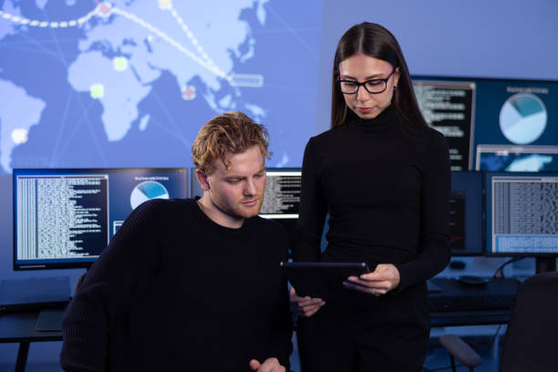 istock Hard working professional cyber security team discuss how to prevent security threats, find vulnerability and solve incidents 2201772113