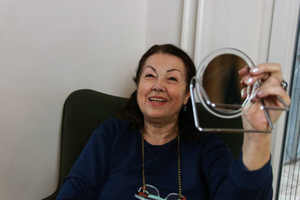 istock Senior woman teaching online make up and enjoy 2201782535
