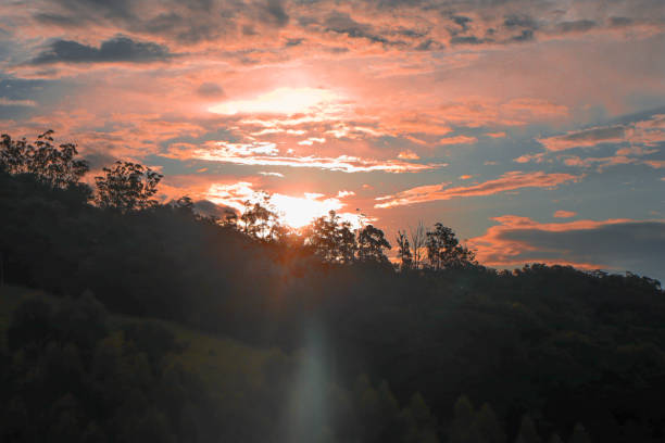 Beautiful landscape of a sunset behind a hill