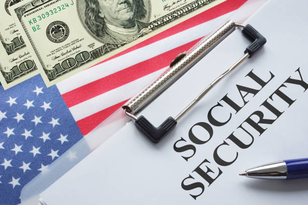 istock Social Security in United States is shown using the text. System of benefits for retired elderly people in USA 2201784078