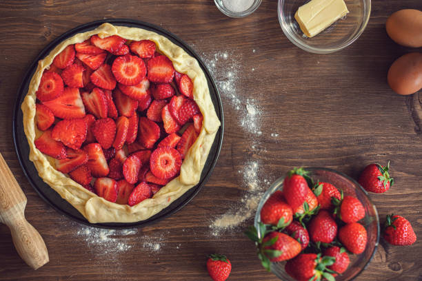 istock Preparing strawberry galette or open strawberry pie 2201788222