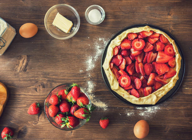istock Preparing strawberry galette or open strawberry pie 2201788223
