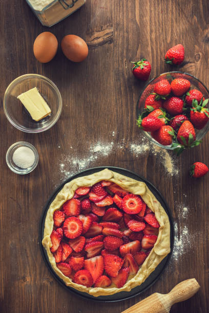 istock Preparing strawberry galette or open strawberry pie 2201788228