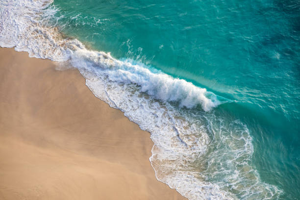 istock Waves breaking on the beach at Nusa Penida, Indonesia 2201791403