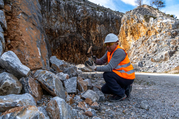 istock Geologist inspecting a mine,Explorers collect soil samples in search of minerals. 2201791482