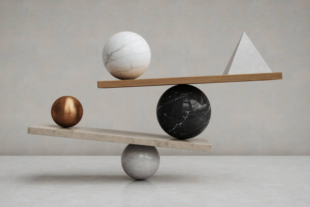 Abstract arrangement of geometric shapes, including spheres, a pyramid, and balancing wooden and stone slabs. \nA minimalist composition representing harmony, balance, and stability.