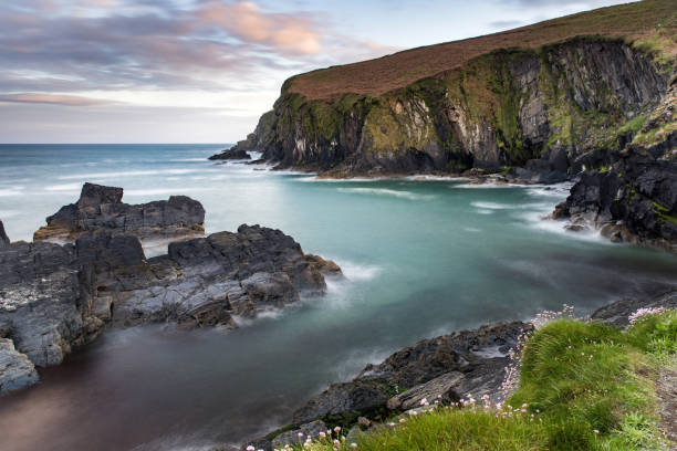 Sunset over the Nohoval Cove in county Cork, Ireland