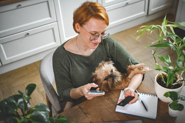 istock woman working at home 2201797087