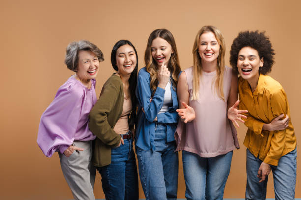 istock Five cheerful multi-ethnic women laughing and having fun together 2201797455
