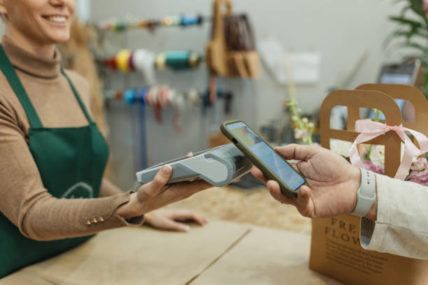 istock Payment Transaction at a Modern Flower Boutique 2201799769