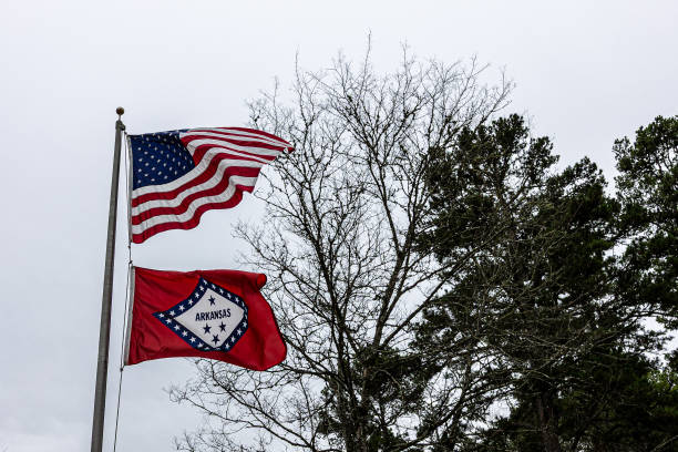 istock USA and Arkansas flag. 2201800265