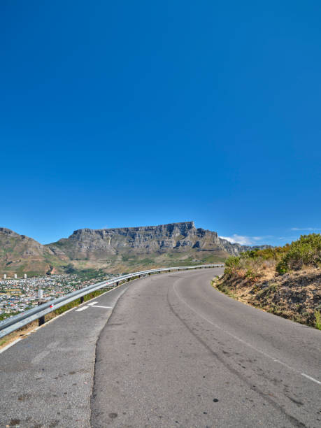istock Winding Road with Table Mountain in the Background on a Clear Day 2201805157