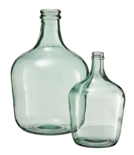 istock glass bottle empty big and small cut out isolated white background with clipping path 2201806323