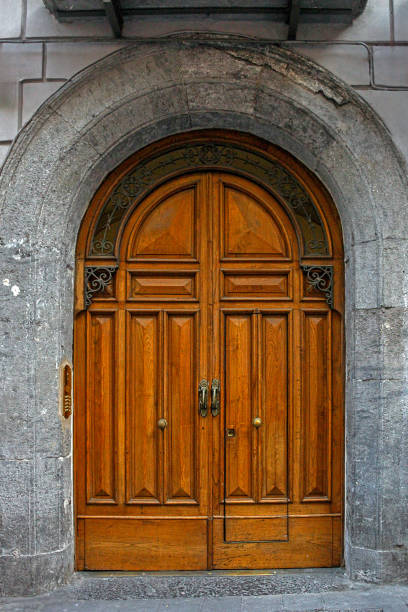 istock Ancient wood brown door exterior 2201811719