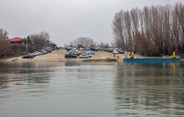 Chiciu, Romania - December 30, 2024: Landscape with river Danube banks and ferry terminal Ostrov. Ostrov is close to the Bulgarian border, with a border crossing linking to the Bulgarian city Silistra