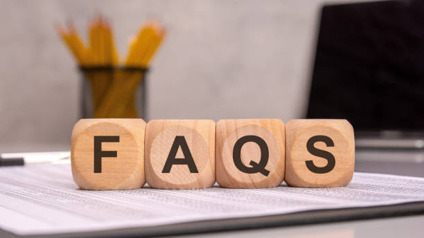 istock wooden cubes spelling 'FAQS' on an office desk, symbolizing customer support, help, and information 2201814654