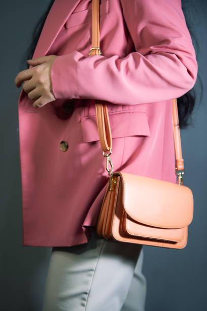 istock woman holding stylish handbag 2201816378