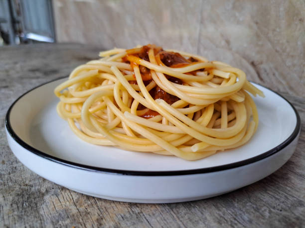 istock Serving Plate Of Spaghetti Bolognese On A Plate. Pasta Food Menu. 2201819251