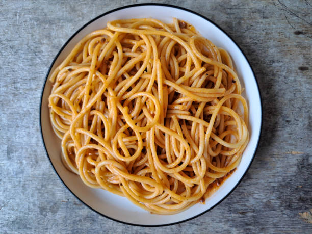 istock Delicious Spaghetti Bolognese On A Plate. Pasta Food Menu. Top View. 2201819337