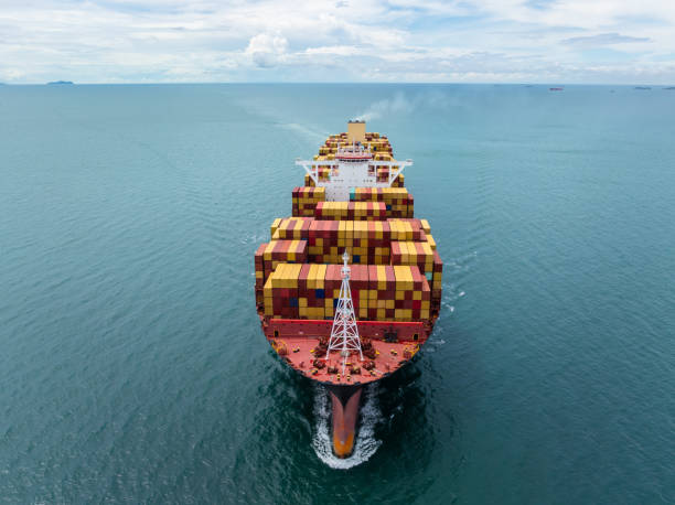 istock cargo logistic container ship sailing in sea import export goods and distributing products to dealer consumers across Asia pacific and worldwide. global business transportation by container ship, front view 2201831897