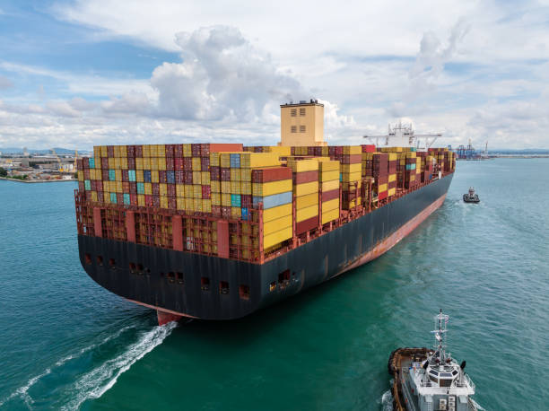 istock cargo container ship carrying sailing in sea import export goods and distributing products to dealer consumers across Asia pacific and worldwide global business transportation by container ship, 2201831903