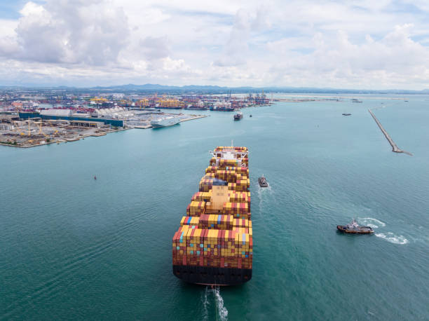 istock cargo container ship carrying sailing in sea import export goods and distributing products to dealer consumers across Asia pacific and worldwide global business transportation by container ship, 2201831905