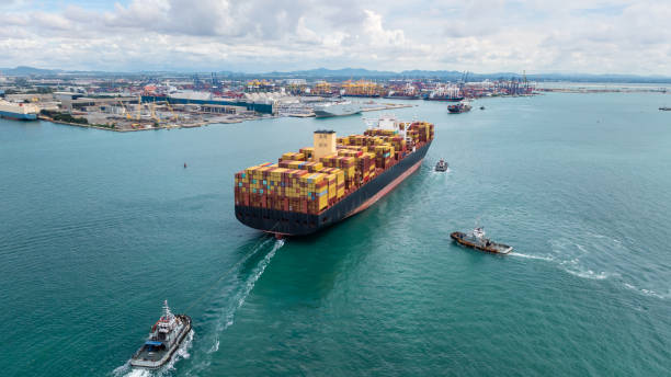 istock cargo container ship carrying sailing in sea import export goods and distributing products to dealer consumers across Asia pacific and worldwide global business transportation by container ship, 2201831906