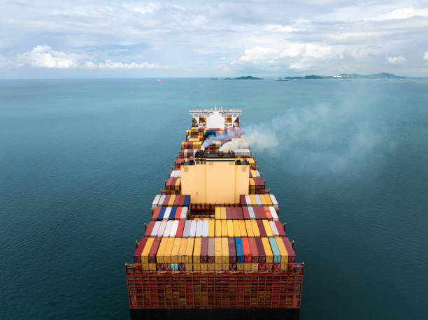 istock cargo container ship carrying sailing in sea import export goods and distributing products to dealer consumers across Asia pacific and worldwide global business transportation by container ship, 2201831940