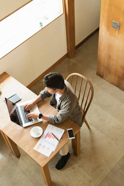 Middle-aged male freelancer who works from home