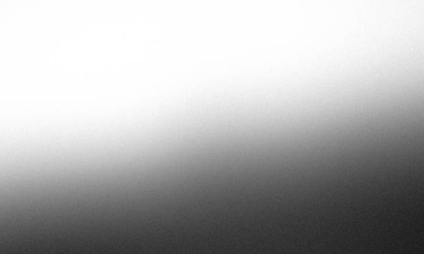 istock Grainy gradient black and white abstract monochrome background with noise texture 2201832533