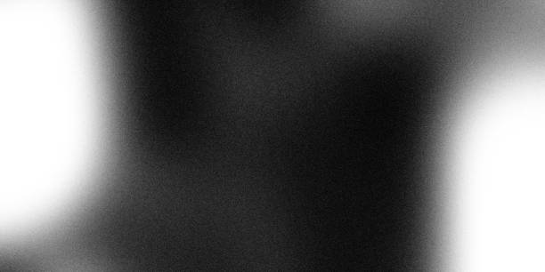 istock Grainy gradient black and white aura abstract dark monochrome background with noise texture 2201832650
