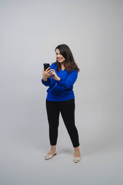 istock Asian Napali Woman with Smart Phone - Standing 2201832983