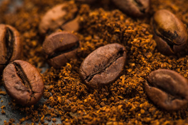 istock Roasted coffee beans and ground coffee. Macro shot. Coffee theme. 2201834145