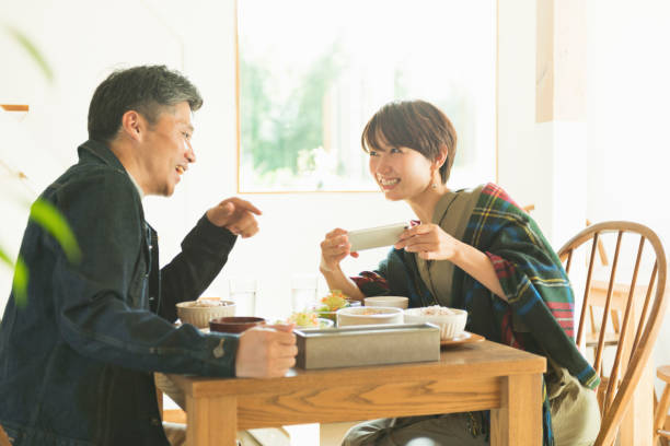 istock Middle-aged couple in a restaurant 2201836974