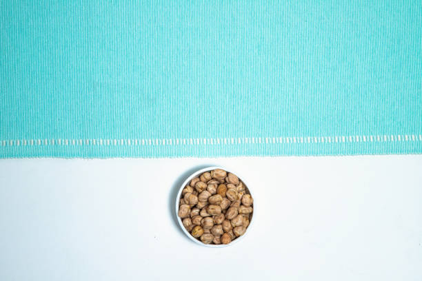 The combination of organic elements and vibrant fabric creates a visually striking contrast, perfect for food blogs, kitchen decor, or healthy lifestyle branding.